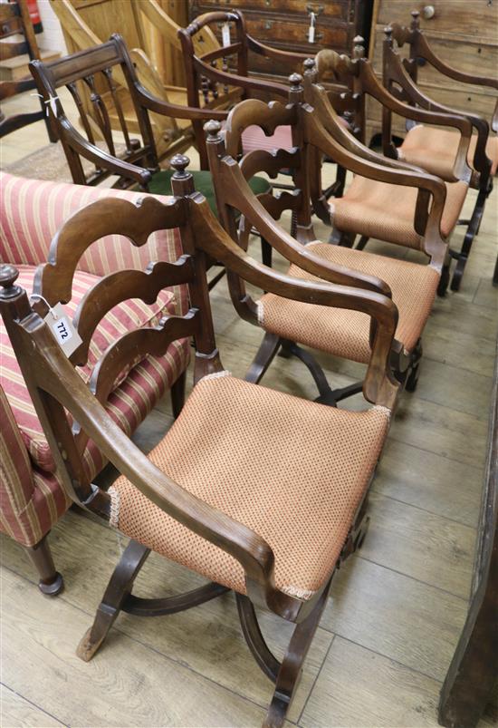 A set of four Spanish style X framed elbow chairs